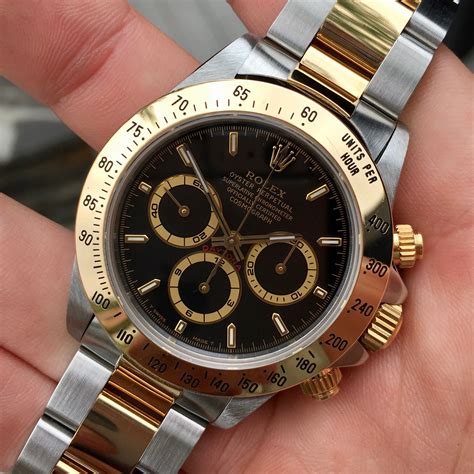 rolex daytona black stealth|Rolex gold bezel.